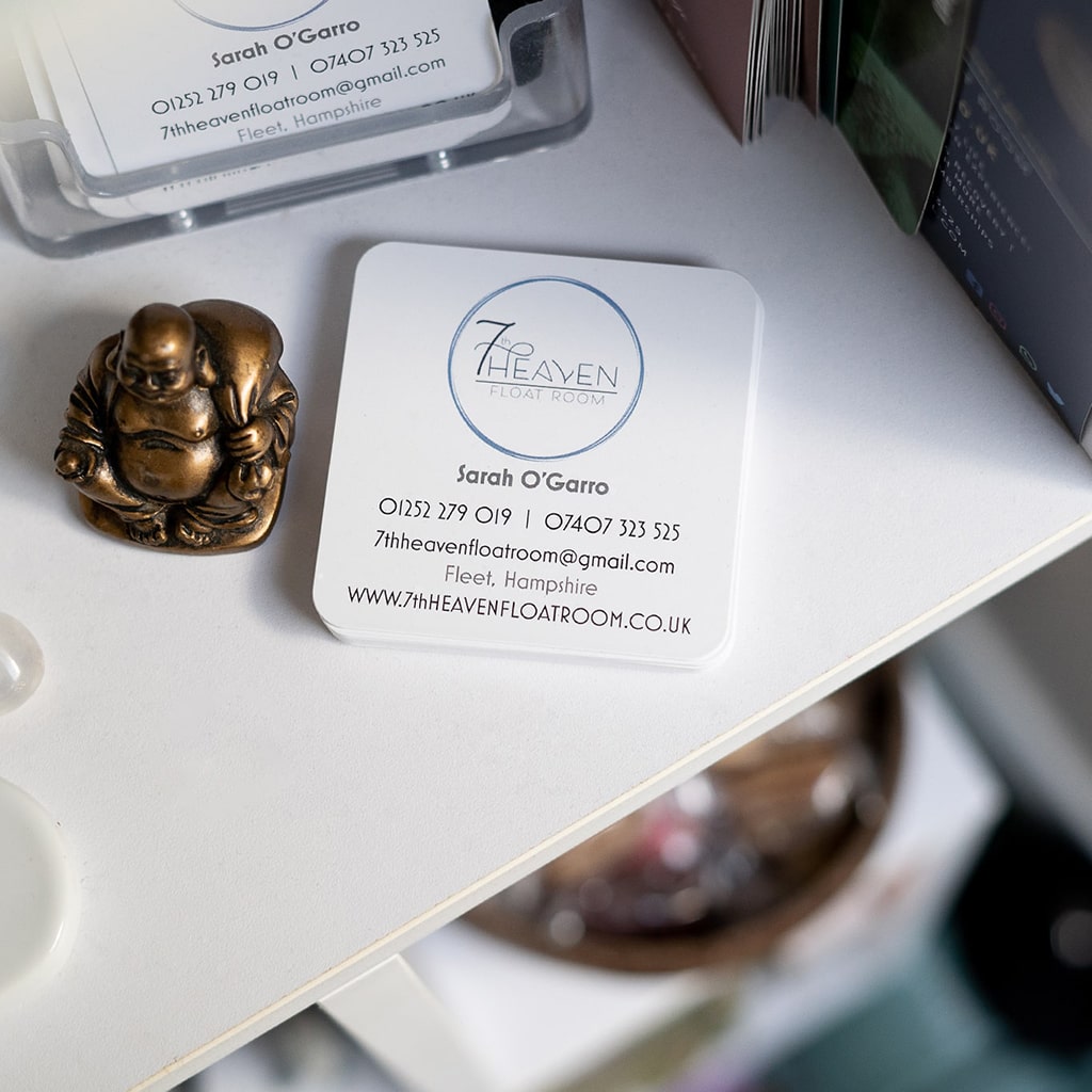 Close up of 7th Heaven branded business cards taken by professional photographer Emma Seaney
